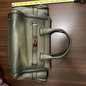 Coach Swagger without crossbody strap, a lean and some scuffs.